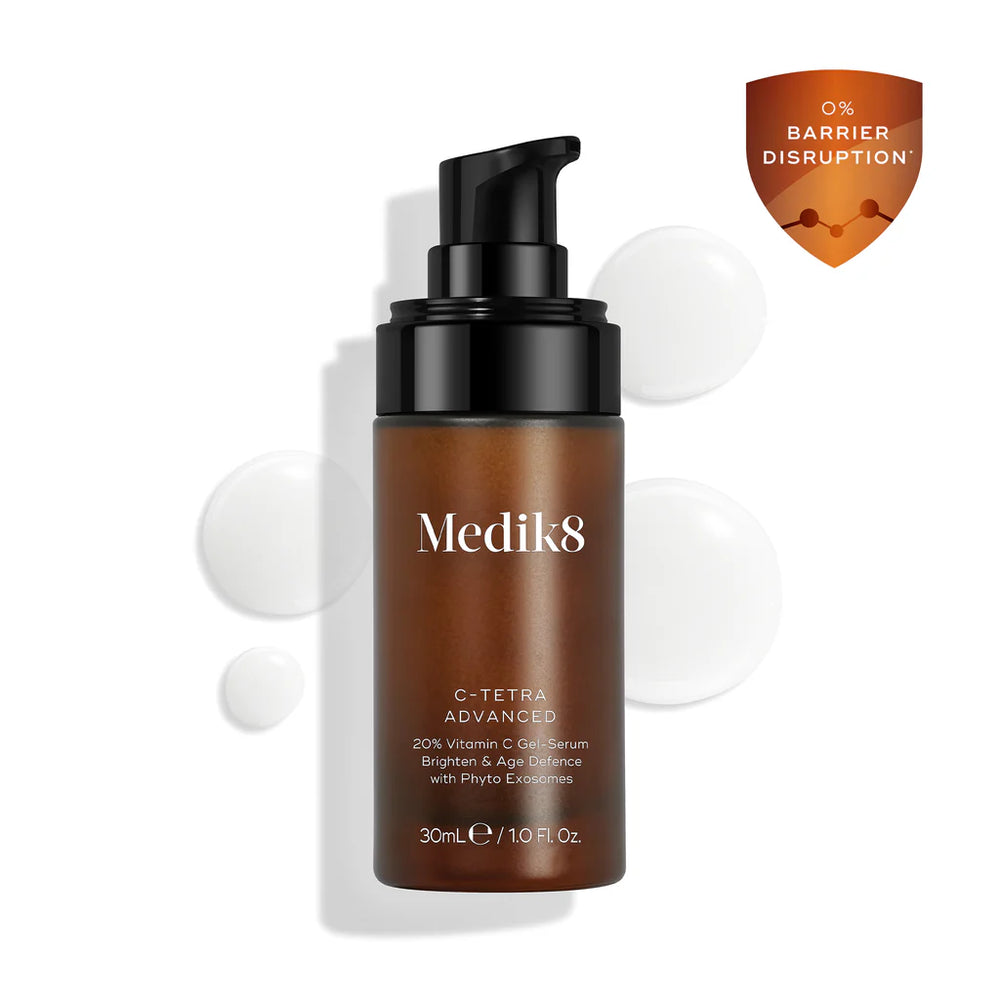 Medik8 skincare serum bottle with pump on a white background