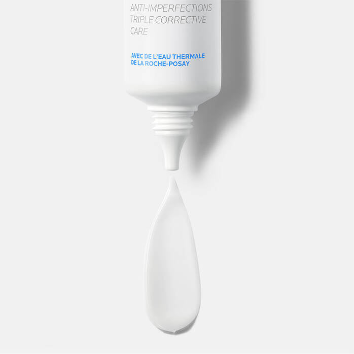 White cosmetic applicator with text on a light gray background