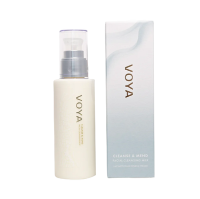 A pump bottle of VOYA facial cleansing milk next to its packaging box.