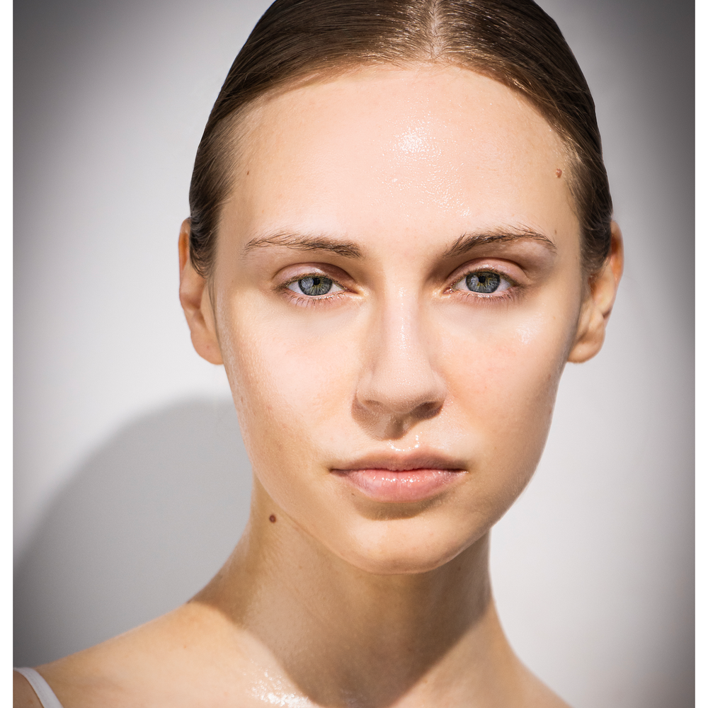 A lady's face after having used the VOYA Hydra Veil Hydrating mask