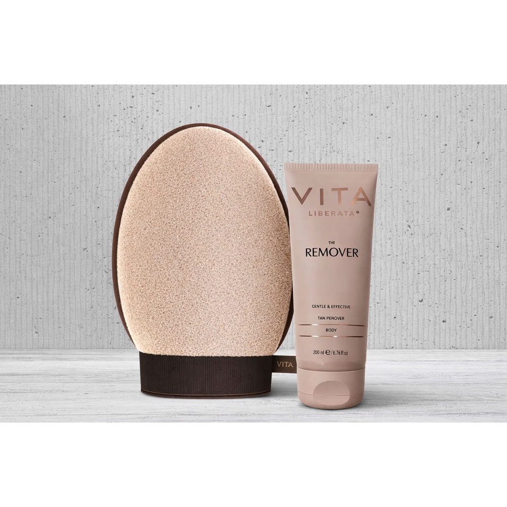 Tanning product with applicator and tube on a textured surface