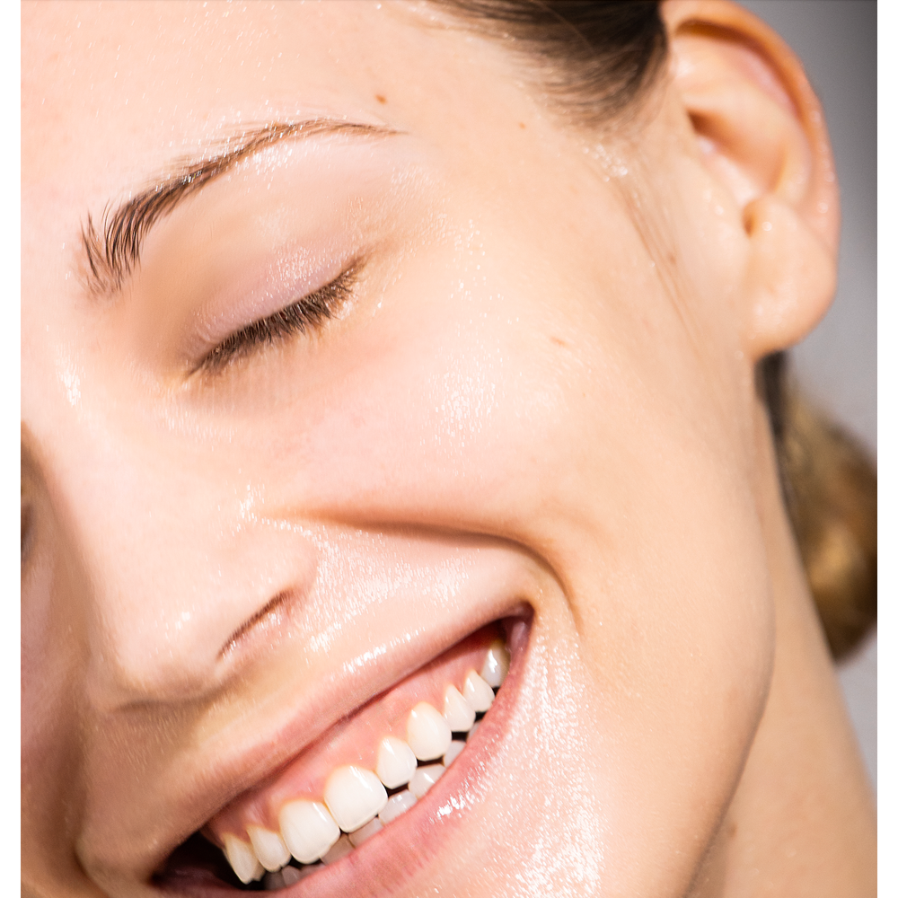 A lady's face after having used the VOYA Hydra Veil Hydrating mask