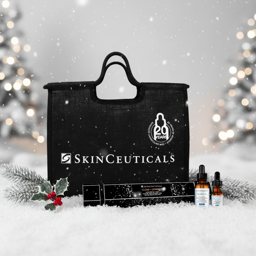 SkinCeuticals product set with black tote bag on a snowy background