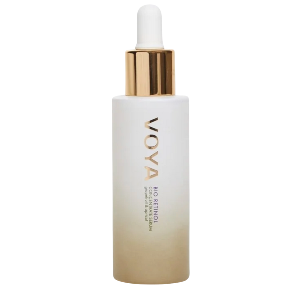 A clear glass bottle with a dropper containing the VOYA Bio Retinol Concentrate Serum, with a white label and gold accents on the bottle.