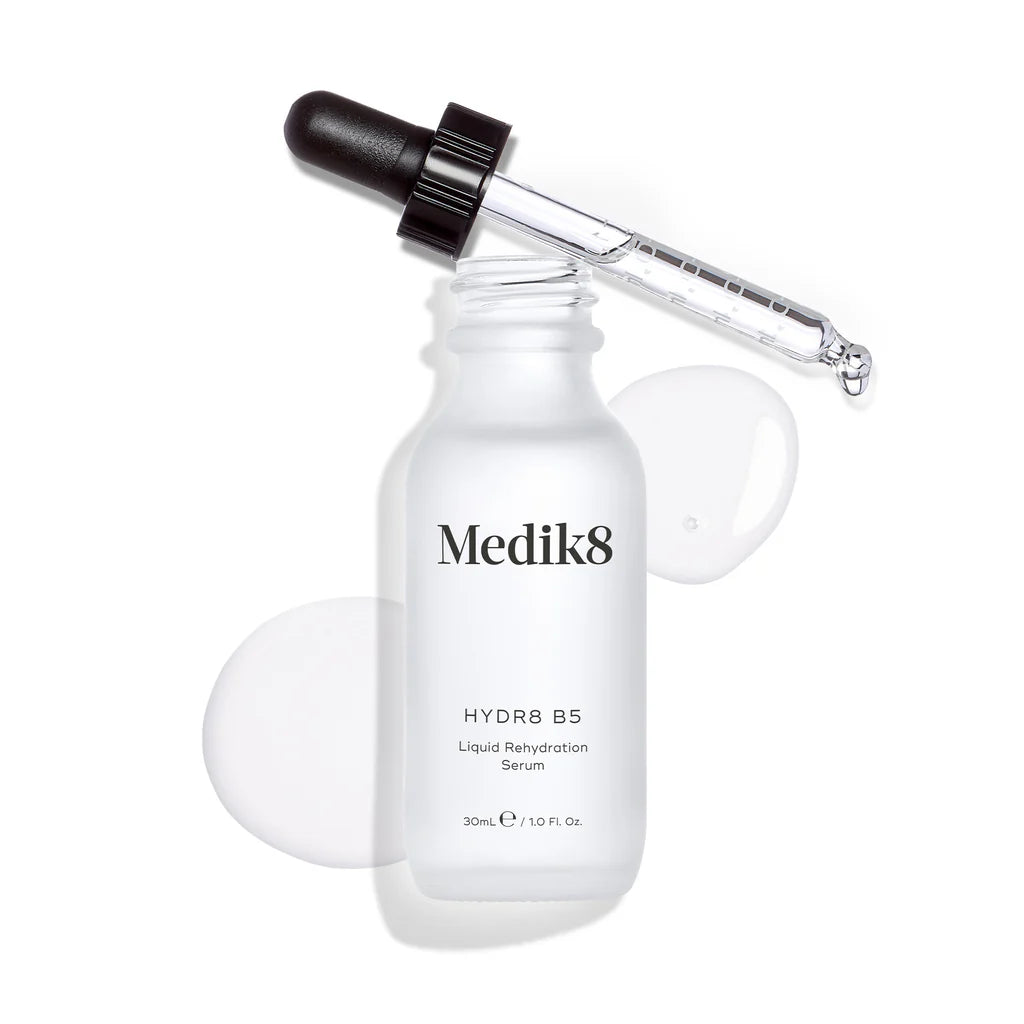 Medik8 serum bottle with dropper on a white background