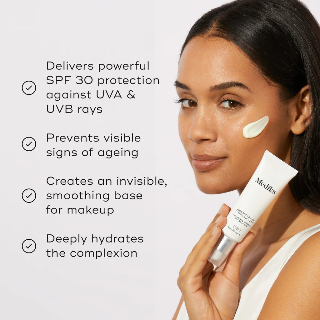 Woman applying Medik8 cream with product details on a light gray background