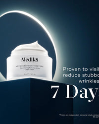 Medik8 skincare cream jar with promotional text on a dark background