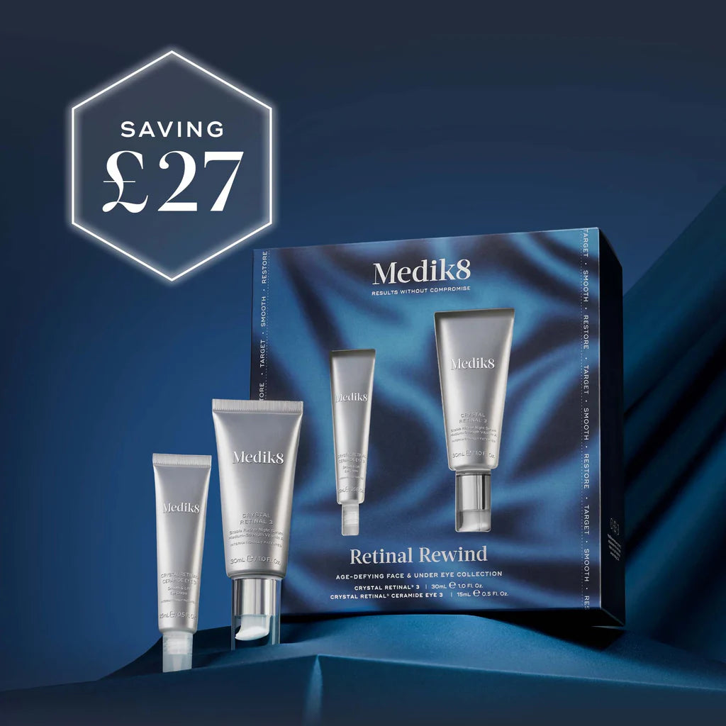 Medik8 skincare set with packaging on a blue background, showing a saving of £27.