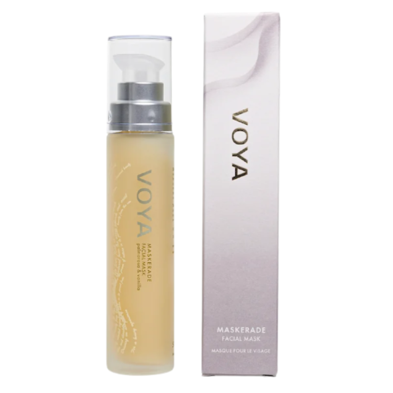 A packaged VOYA Maskerade Gel Face Mask product, with a clear tube showing the light gel texture of the mask inside, placed next to its white and silver packaging box.