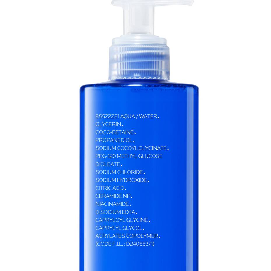Blue bottle with a pump on a white background