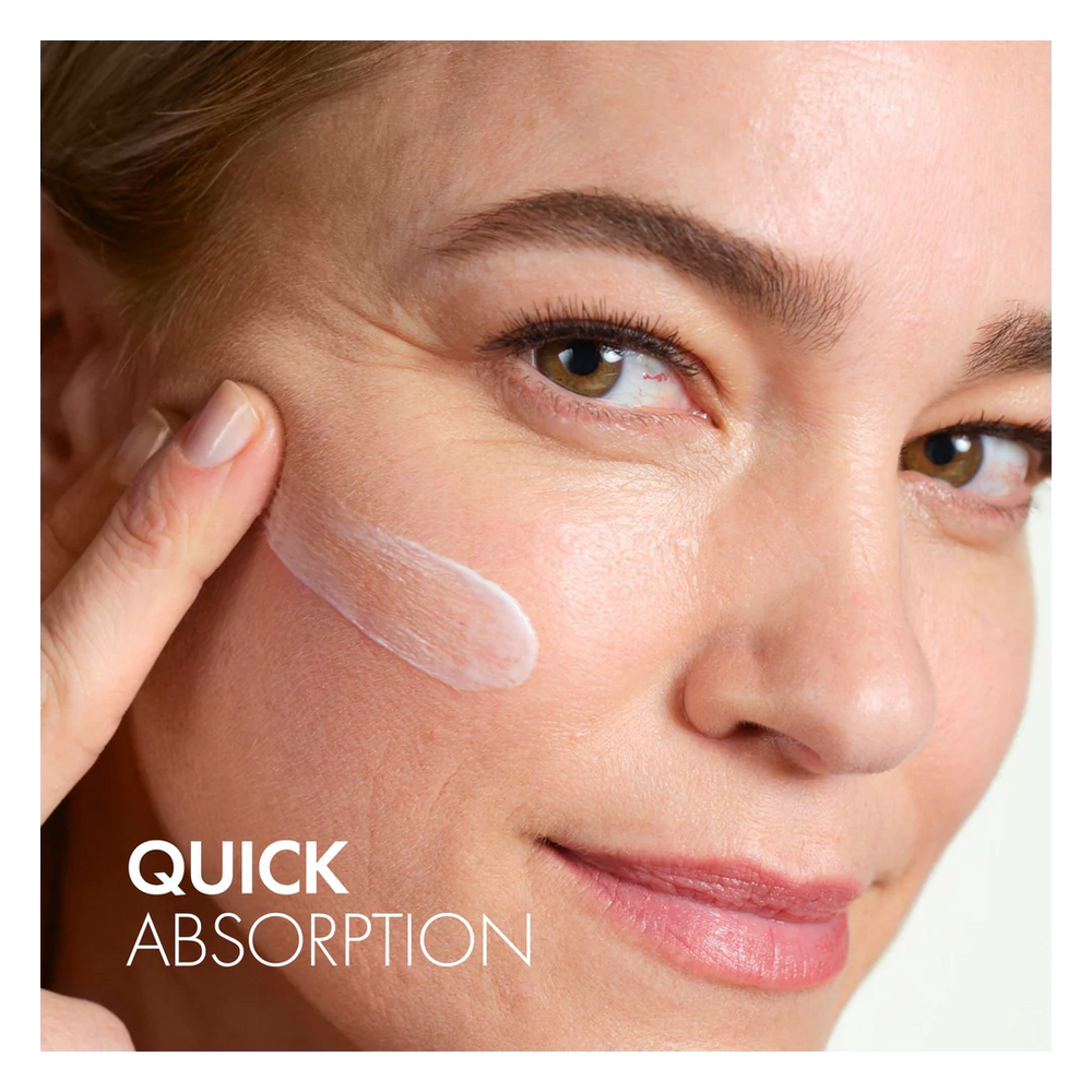 Woman applying cream to her face with 'Quick Absorption' text