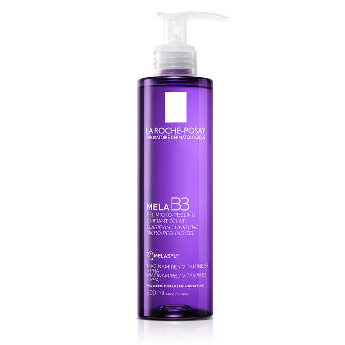 Purple bottle with white pump of La Roche-Posay Mela B3 on a white background