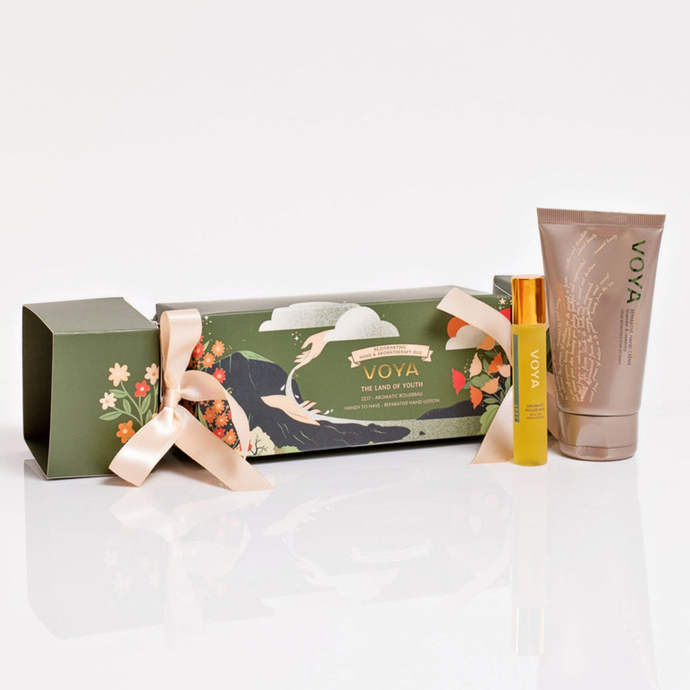 VOYA Land of Youth Hand & Aromatherapy Duo gift set cracker with Handy to Have Reparative Hand Lotion (10ml) and Zest Aromatic Rollerball (10ml)