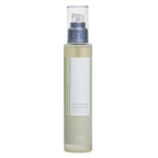 A clear bottle of Voya Oh So Scented Luxury Room Spray with a white label and spray nozzle, filled with a yellow liquid.