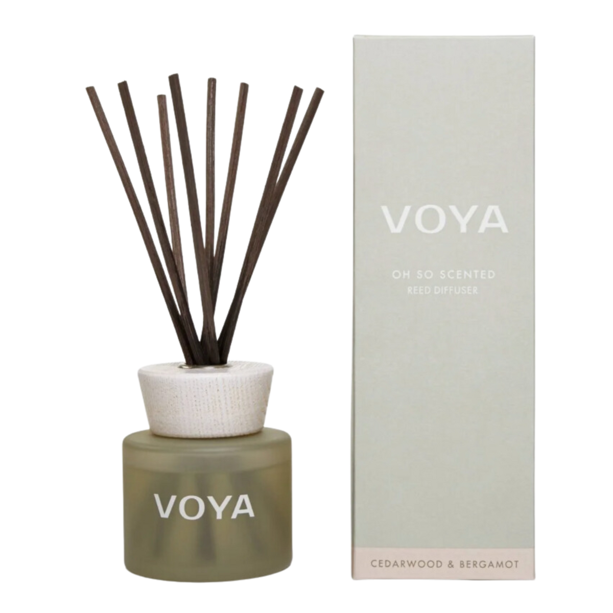 A VOYA reed diffuser with cedar and bergamot scent, consisting of a glass bottle, decorative cap and a bundle of reed sticks.