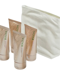 Set of Voya skincare products including tubes and a pouch on a white background