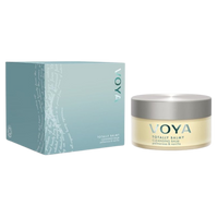 A product image featuring a jar labeled 'VOYA' next to its blue box packaging. The jar contains a cleansing balm and the box is marked with the same brand.