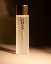 Voya Bio Glow skincare bottle on a dark background