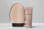 Tanning product with applicator and tube on a textured surface