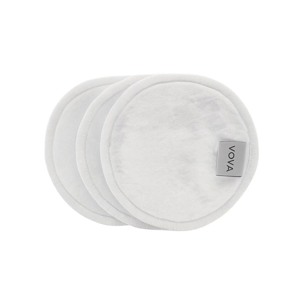 Three white VOYA Bamboo pads with the VOYA brand label