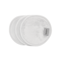Three white VOYA Bamboo pads with the VOYA brand label