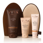 Vita Liberata tanning products including lotion, gradual build, and body blur with a brown pouch on a white background.
