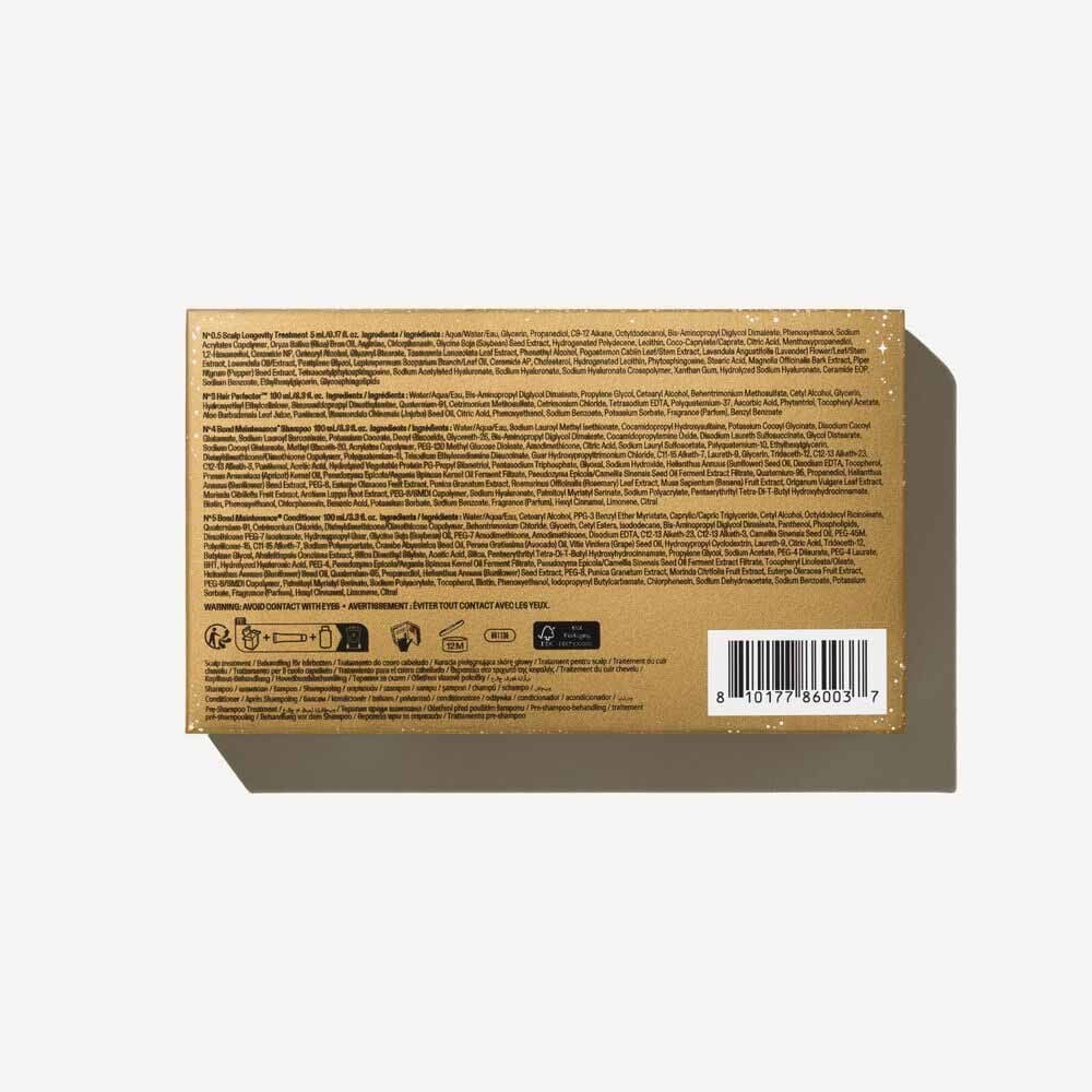 Back view of a cardboard box with text and a barcode on a light gray background