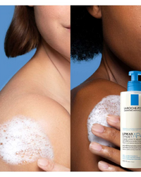 Two people with soapy shoulders and a bottle of La Roche-Posay Lipikar product.
