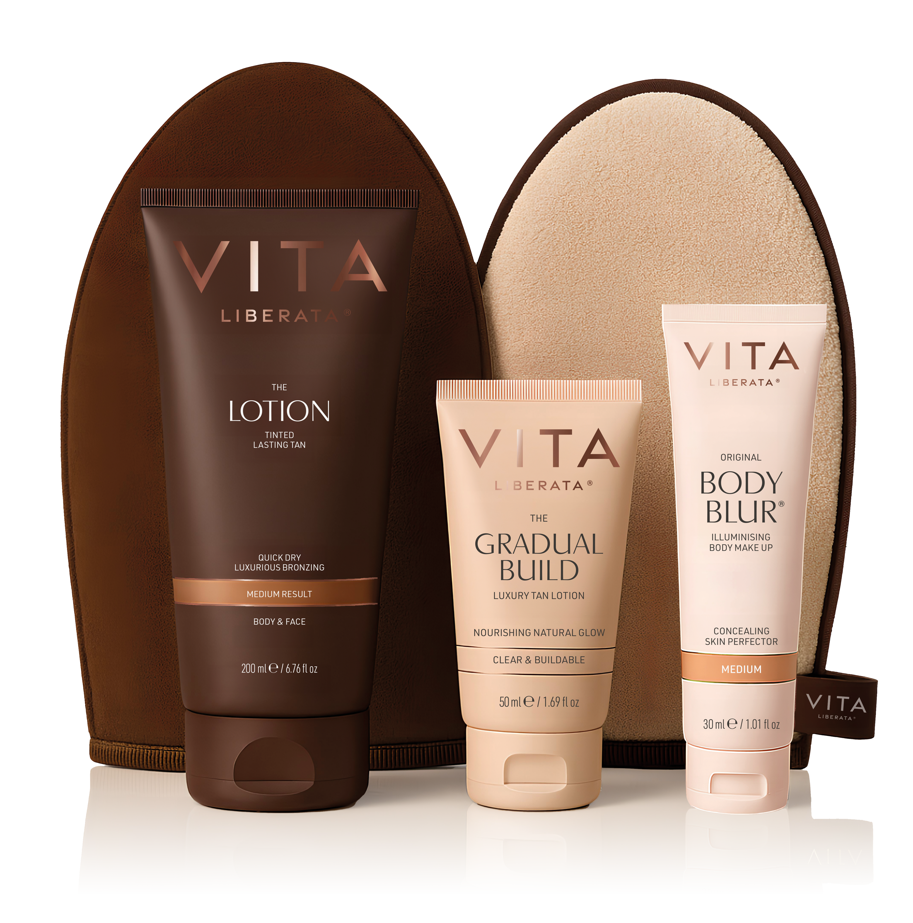 Vita Liberata tanning products including lotion, gradual build, and body blur with a brown pouch on a white background.