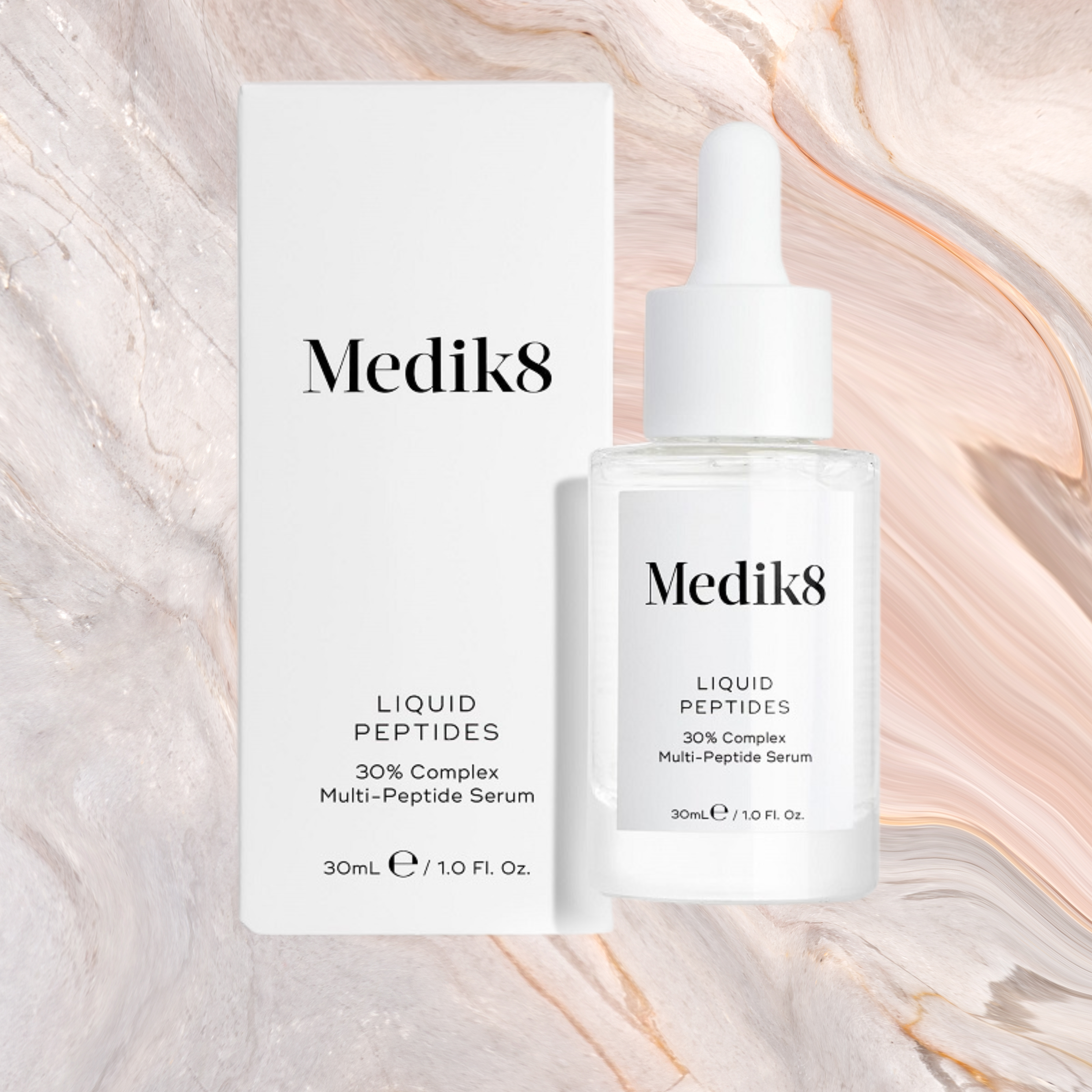 Medik8 Liquid Peptides serum bottle and packaging on a marble background