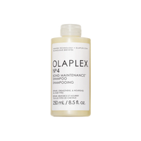 Olaplex No.4 Bond Maintenance Shampoo 250ml in clear plastic bottle with lid