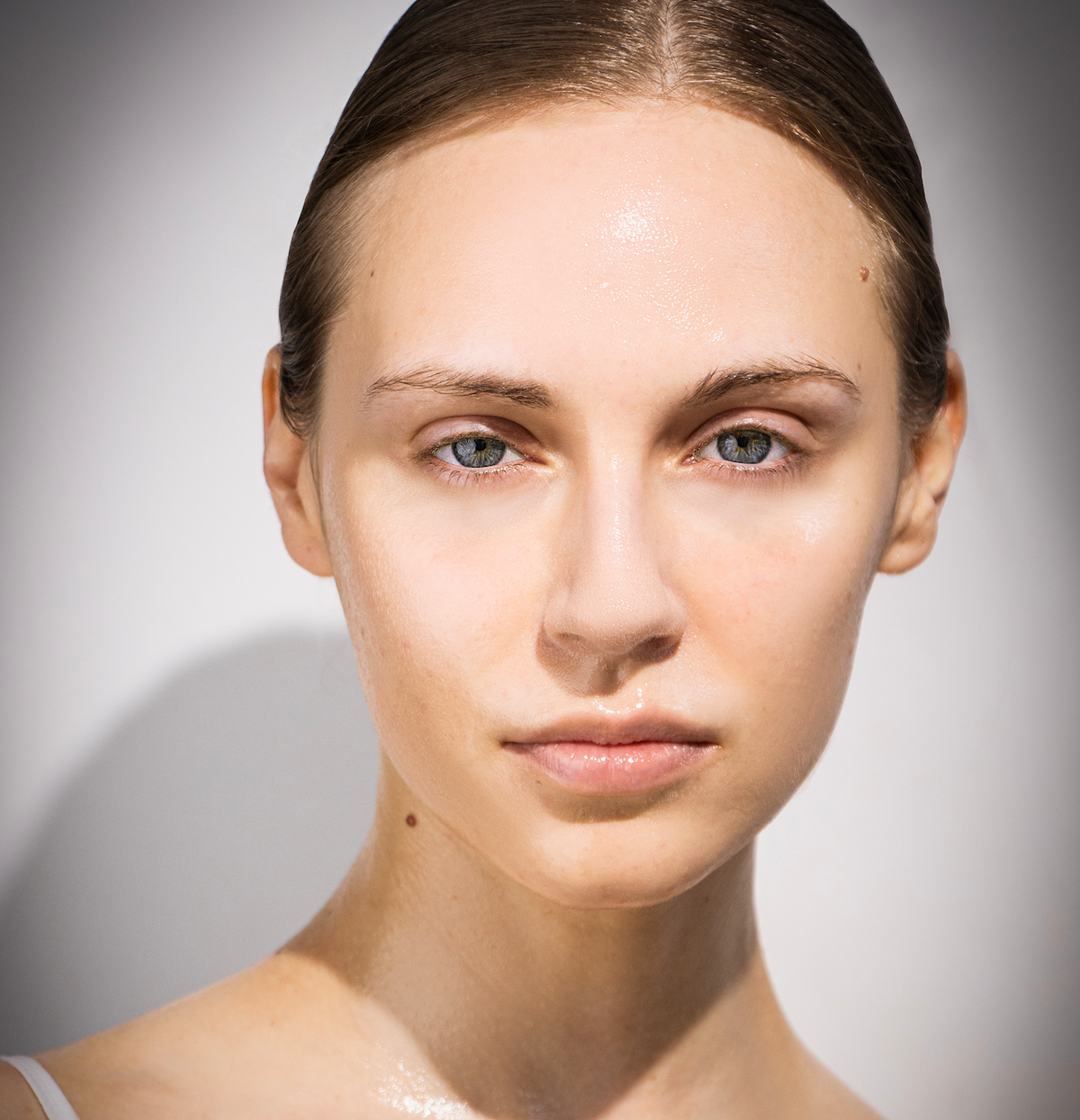 A lady's face after having used the VOYA Hydra Veil Hydrating mask