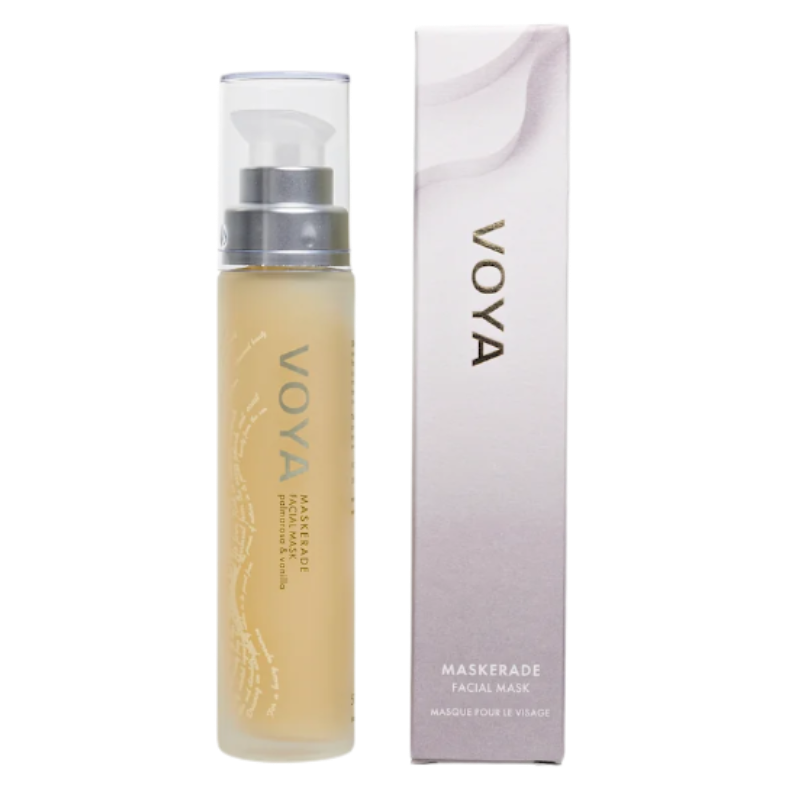 A packaged VOYA Maskerade Gel Face Mask product, with a clear tube showing the light gel texture of the mask inside, placed next to its white and silver packaging box.