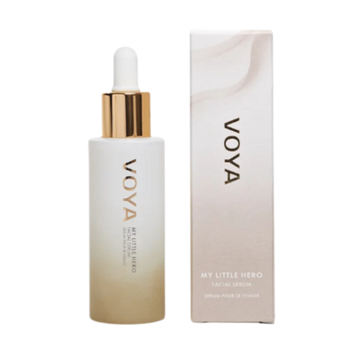 A VOYA My Little Hero bottle with a white label and a gold dropper containing facial serum, alongside its packaging box.
