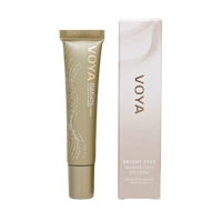 A tube of VOYA Bright Eyes Regenerating Eye Cream next to its packaging box, both featuring the brand's logo and the product name.