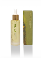Voya hair serum bottle with dropper and packaging on a white background