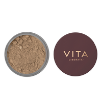 Vita Liberata Trystal Minerals powder with open container on a white background
