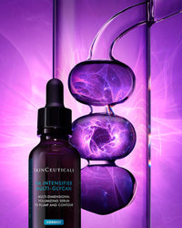 Skinceuticals serum bottle with dropper on a purple background