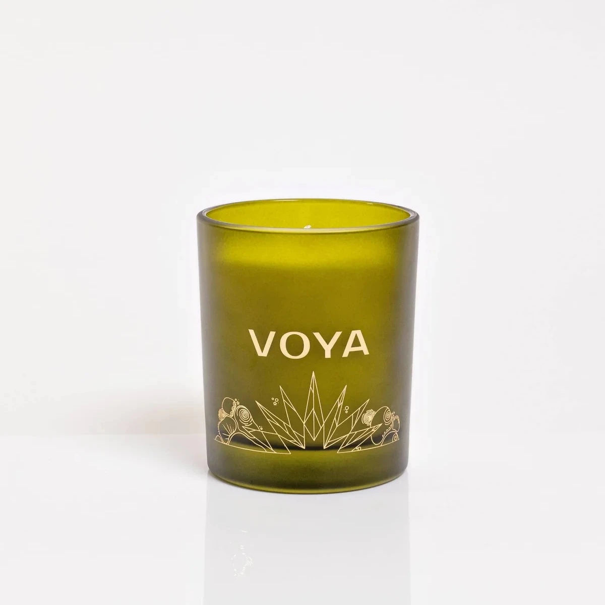 VOYA The Land of Light Christmas candle Green with 'VOYA' branding on a white background