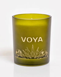 VOYA The Land of Light Christmas candle Green with 'VOYA' branding on a white background
