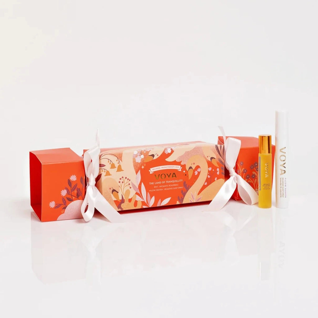 VOYA Gift cracker with soap and book on a white background