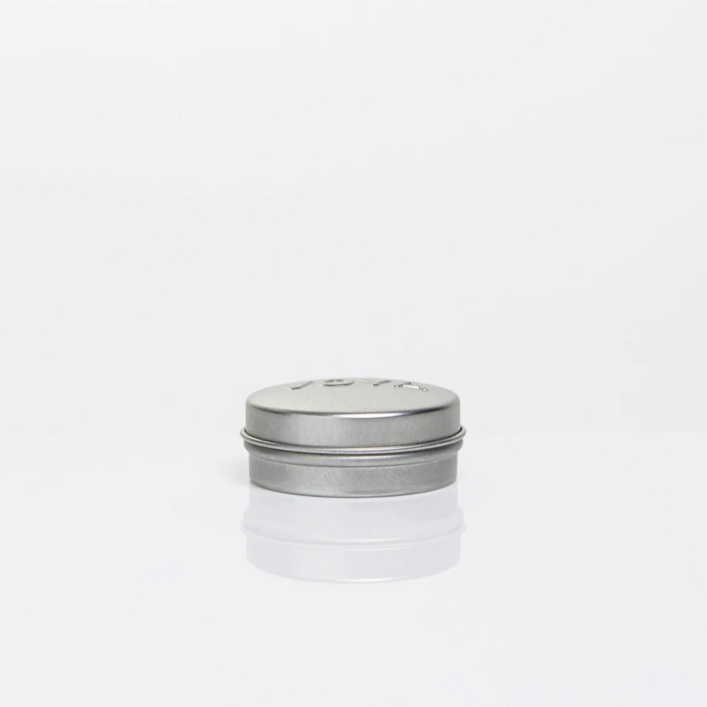 Balmelicious VOYA tin side angle