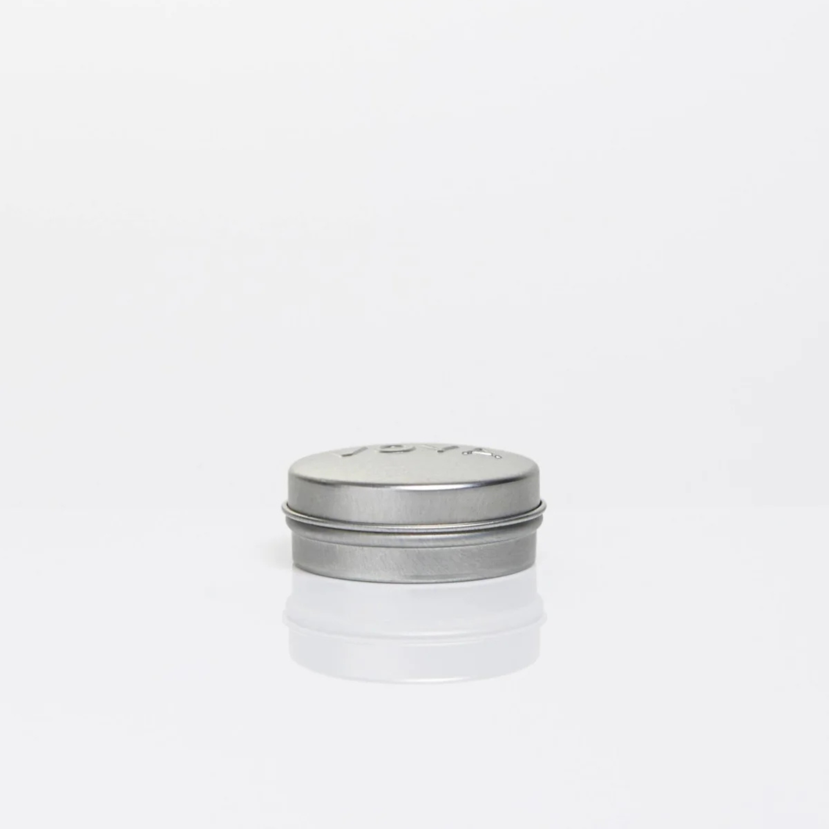 Balmelicious VOYA tin side angle