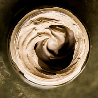 Voya Get Glowing Illuminating Clay Mask in glass jar with lid