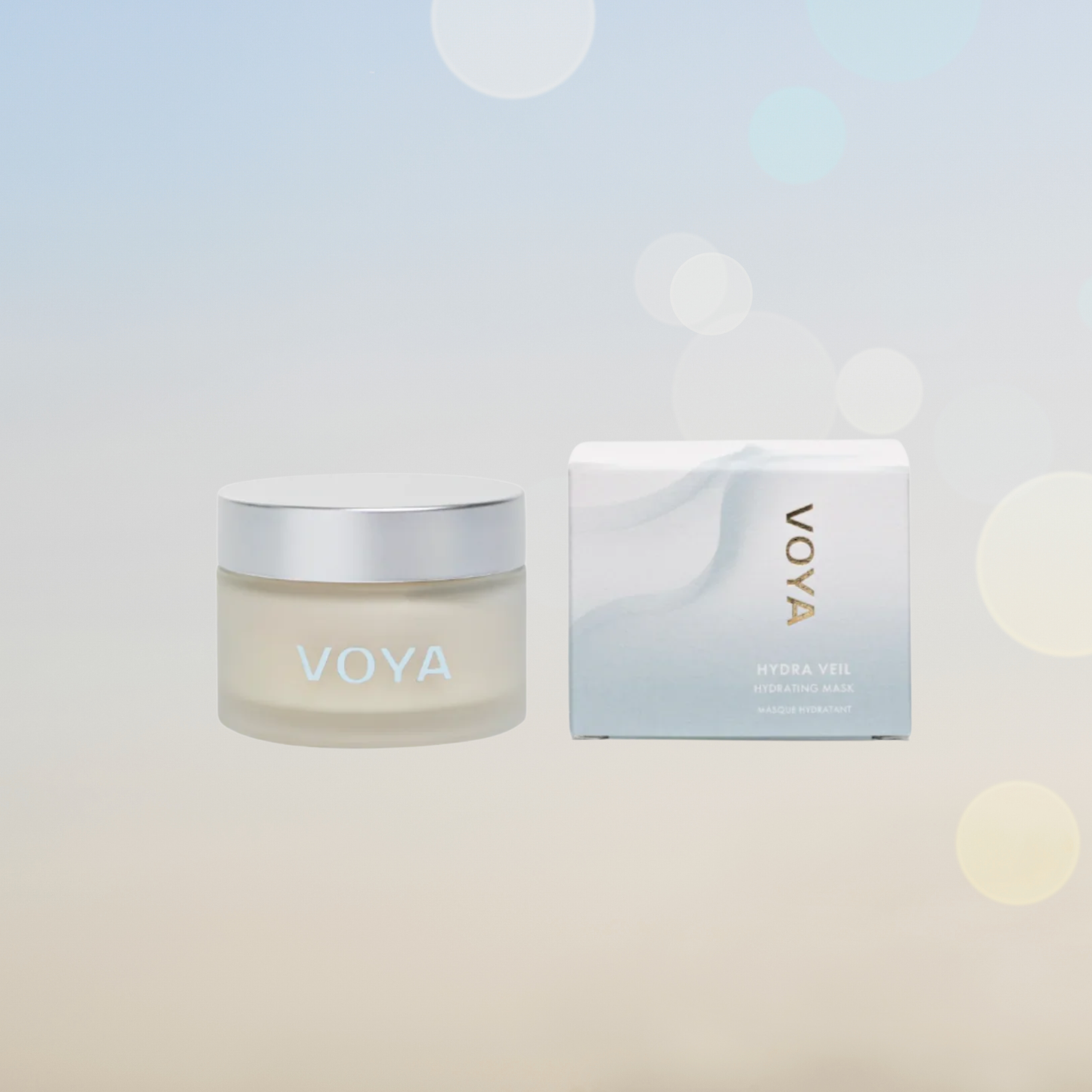 Voya Hydra Veil Hydrating Face Mask in glass jar with lid next to its box, a drink of water for the skin
