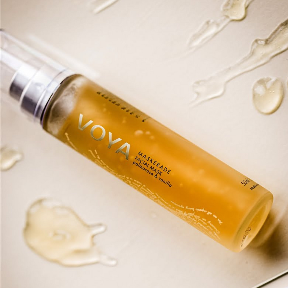 Voya Maskerade Soothing Facial Mask in glass pump bottle with clear lid, hydrating, tightening and brightening