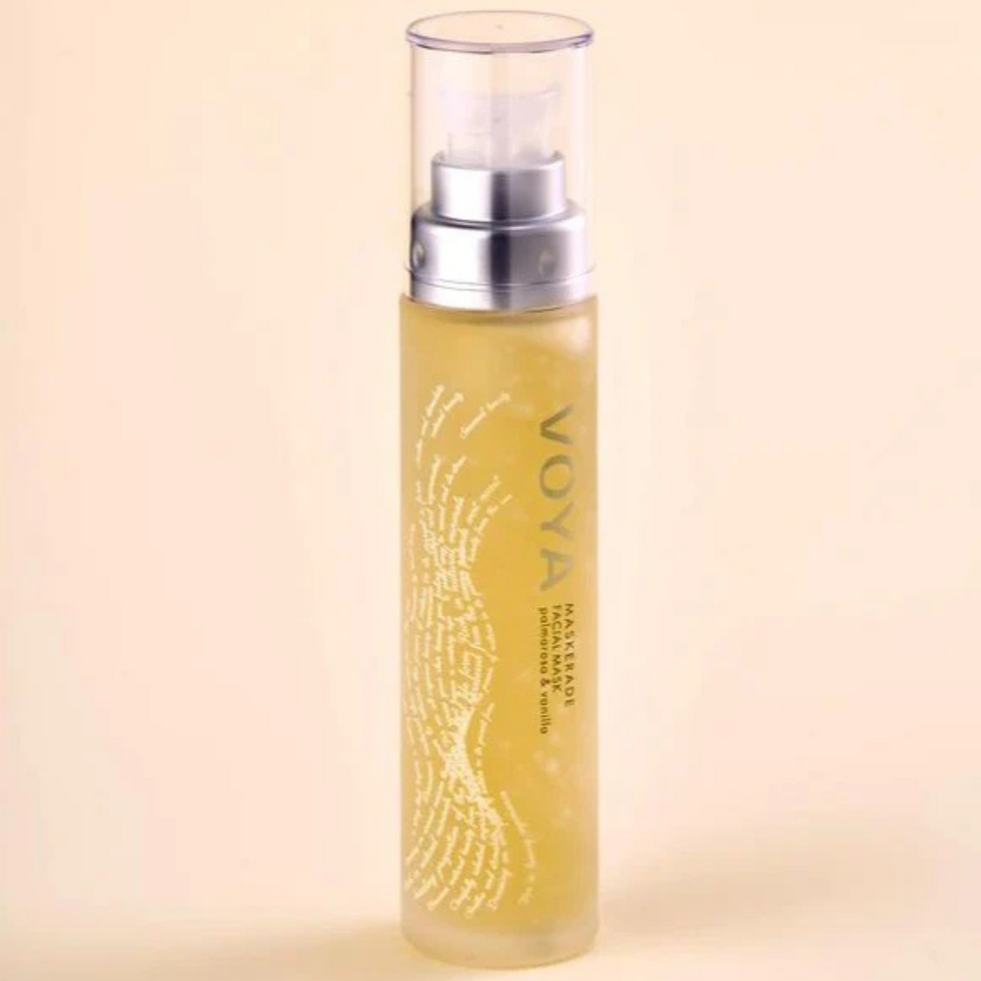 Voya Maskerade Soothing Facial Mask in glass pump bottle with clear lid, hydrating, tightening and brightening