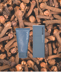 VOYA Men's Range Rejuvenating Moisturiser in blue tube standing next to its box
