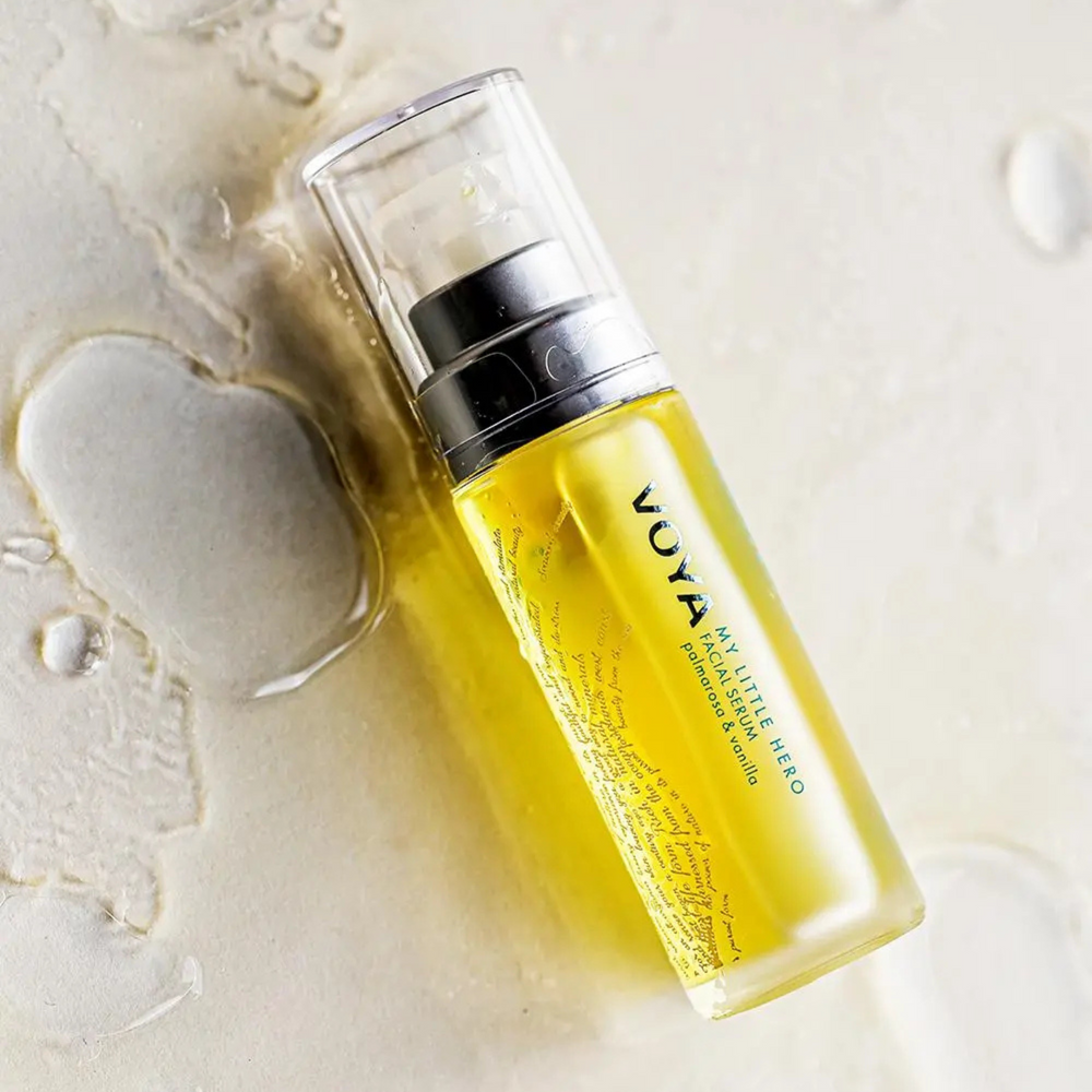 Voya My Little Hero Facial Serum in glass bottle with pump and clear plastic lid