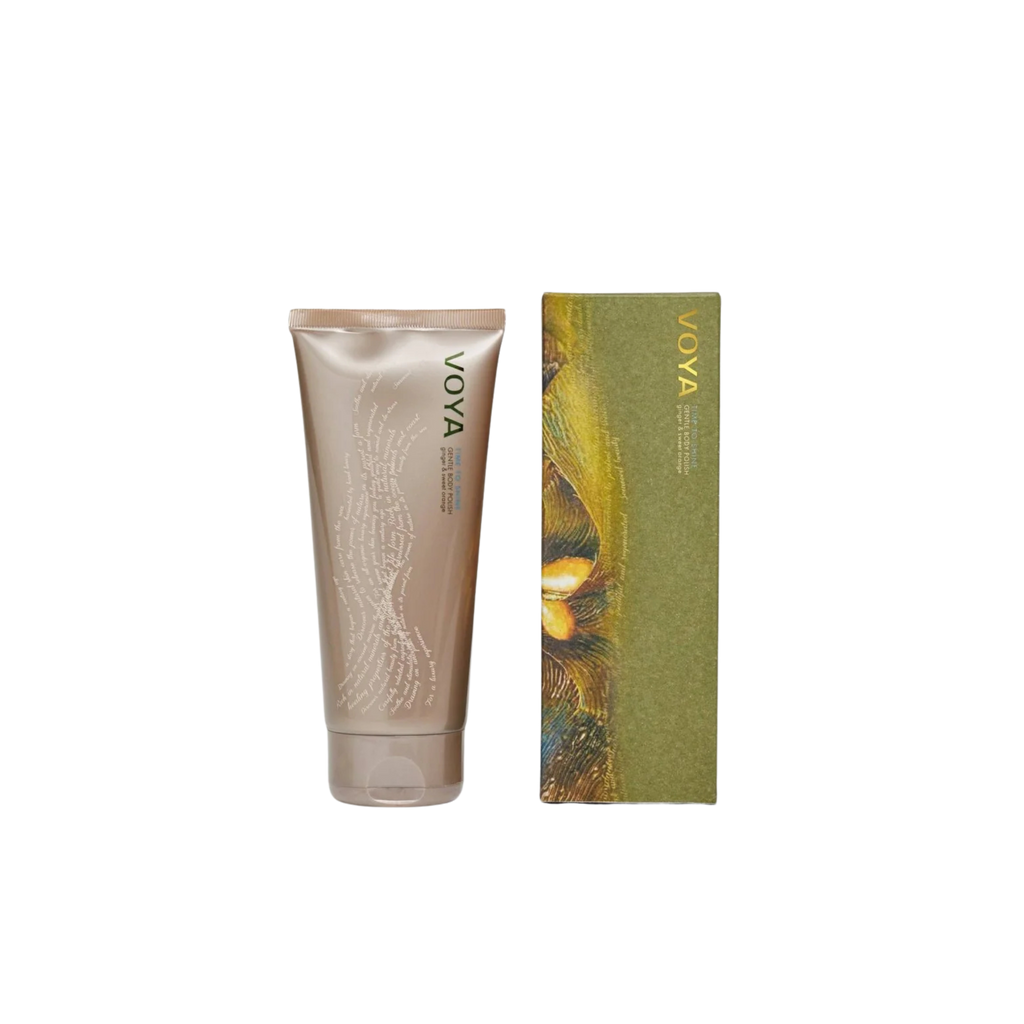 Voya Time To Shine Gentle Body Polish in gold tube packaging next to it 